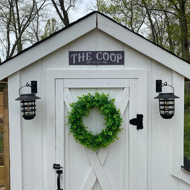 The coop black chicken coop sign